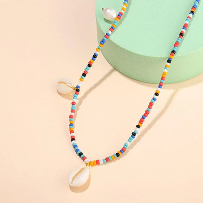 Collier Coquillages Perlé Multicolore avec Perles de Riz Nacrées Tressées à la Main - Or