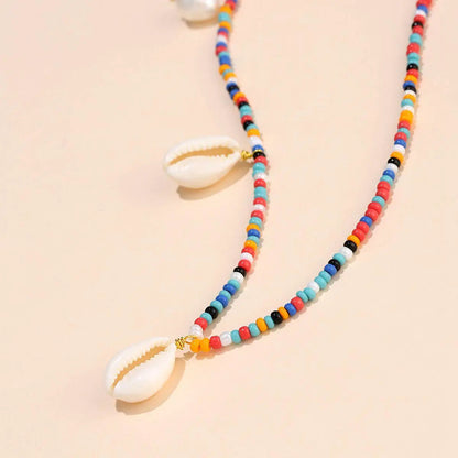 Collier Coquillages Perlé Multicolore avec Perles de Riz Nacrées Tressées à la Main - Or